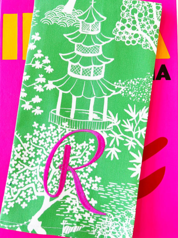 green pagoda tea towel with pink monogram R