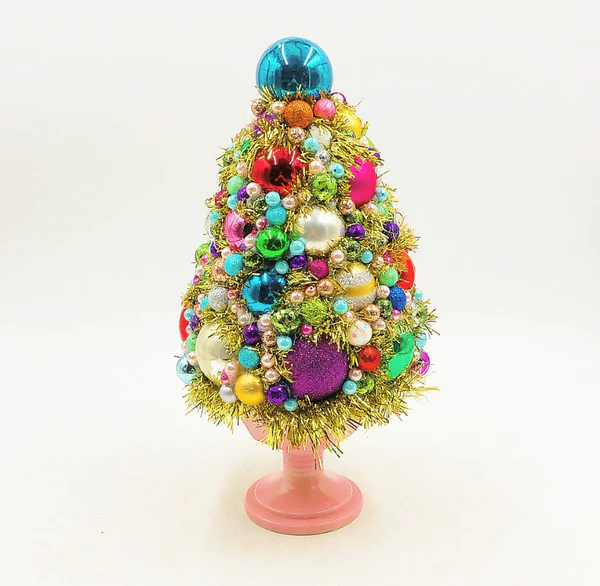 vintage Christmas tree in pink and gold with colorful ornaments